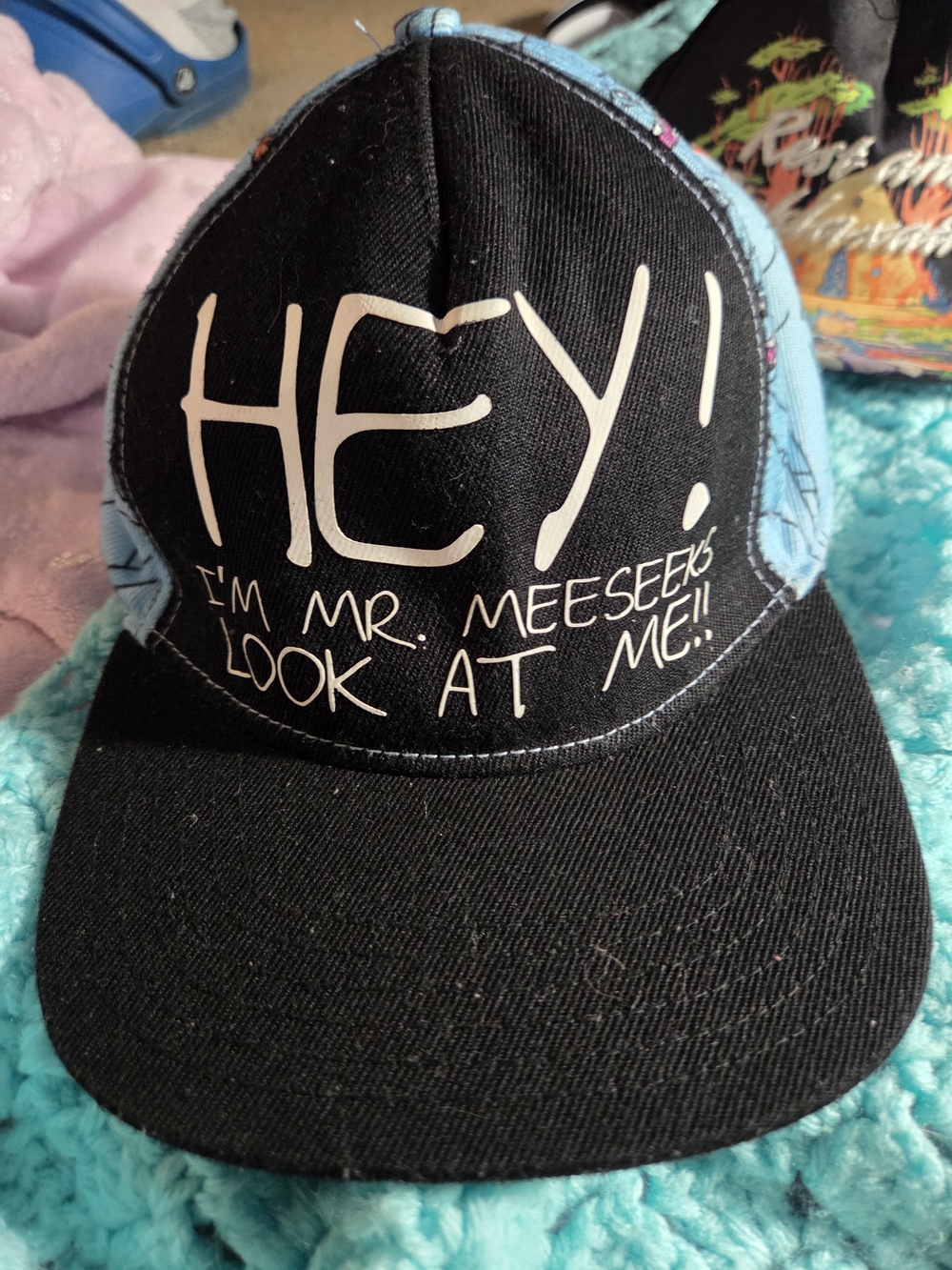 Spencer's Black and Light Blue "HEY! I'm Mr. Meeseeks" Trucker Hat